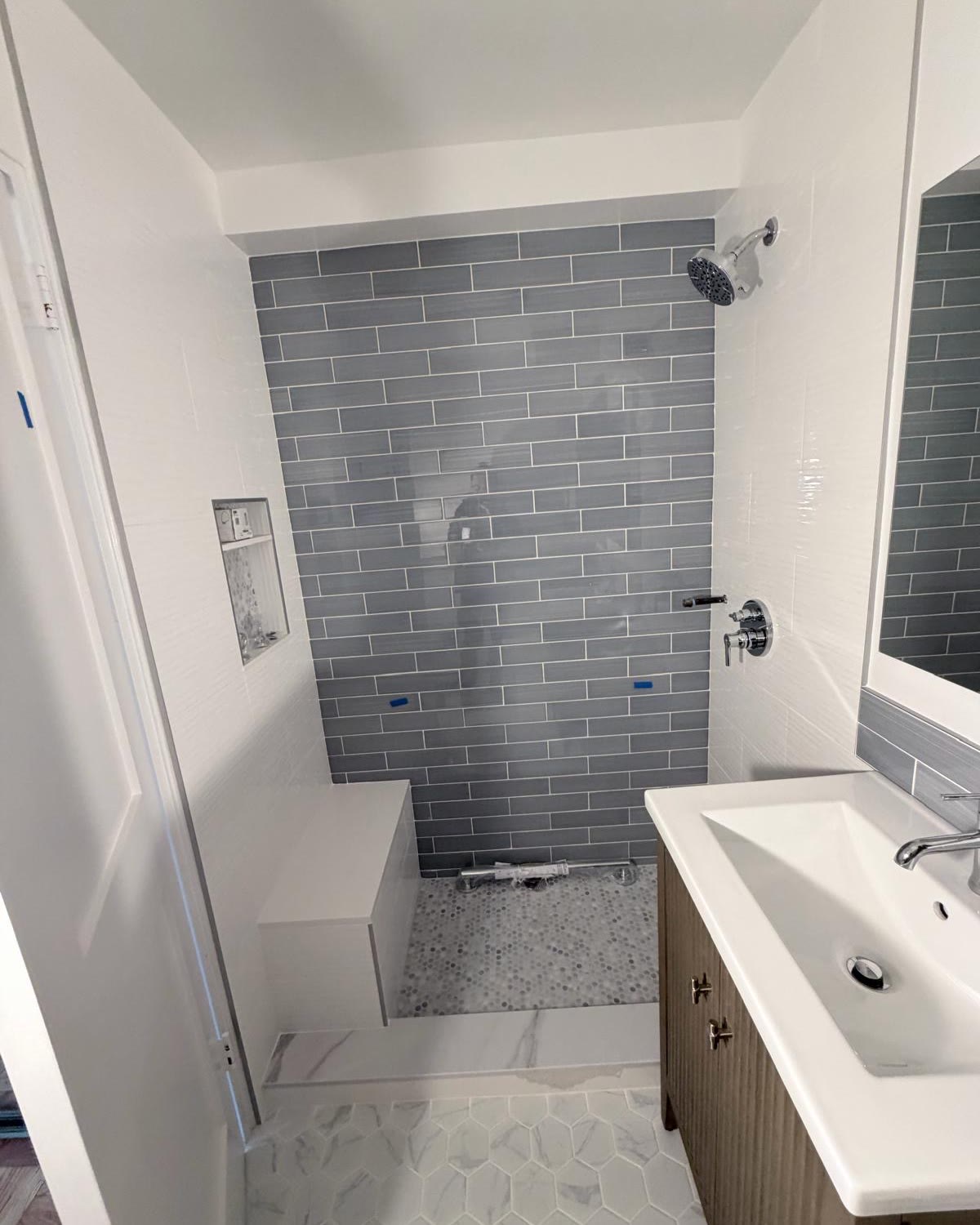 Before shower area at 84 Clinton, Lower East Side Manhattan, before sliding glass shower door installation.