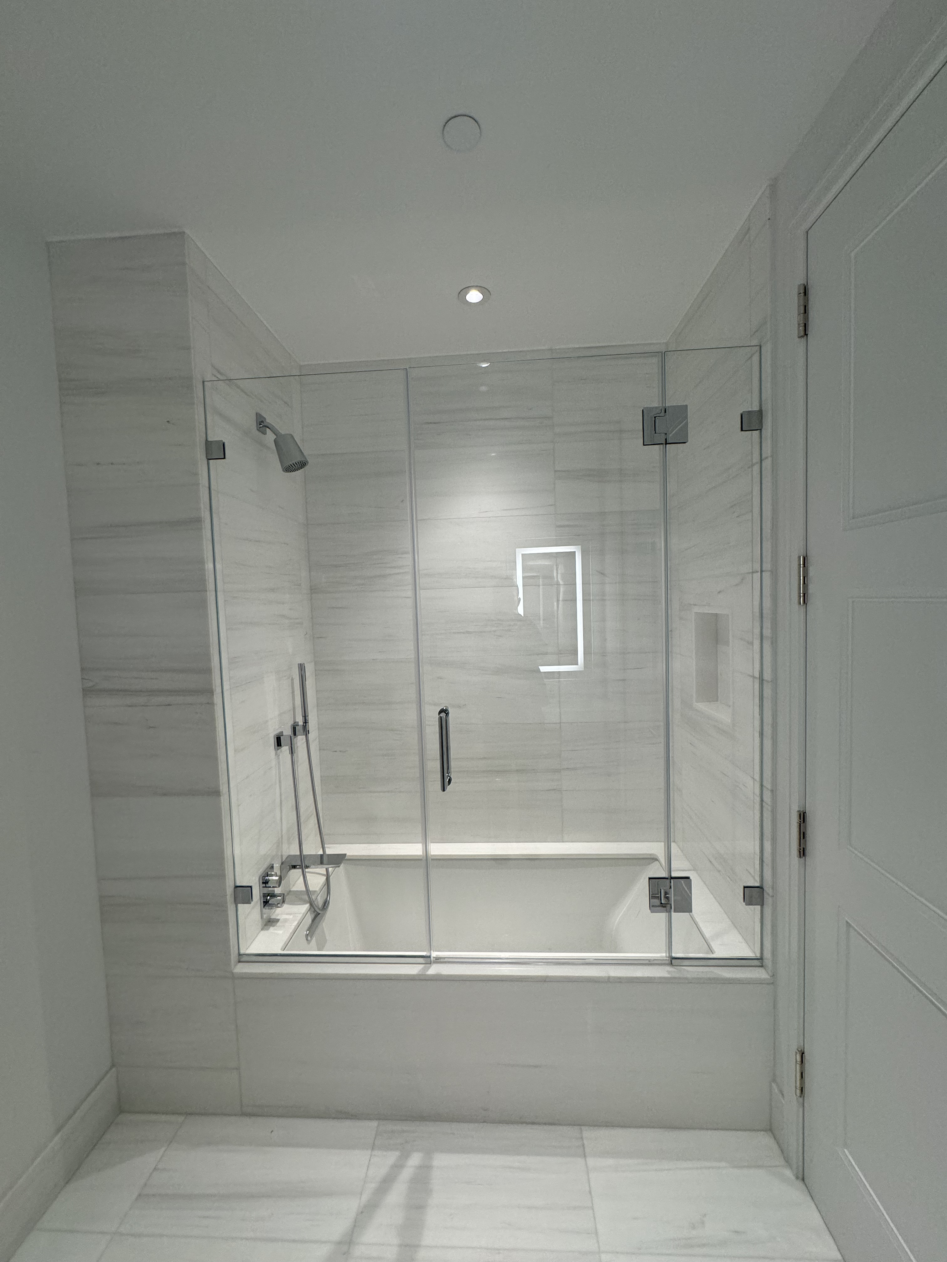 Frameless enclosure NYC apartment