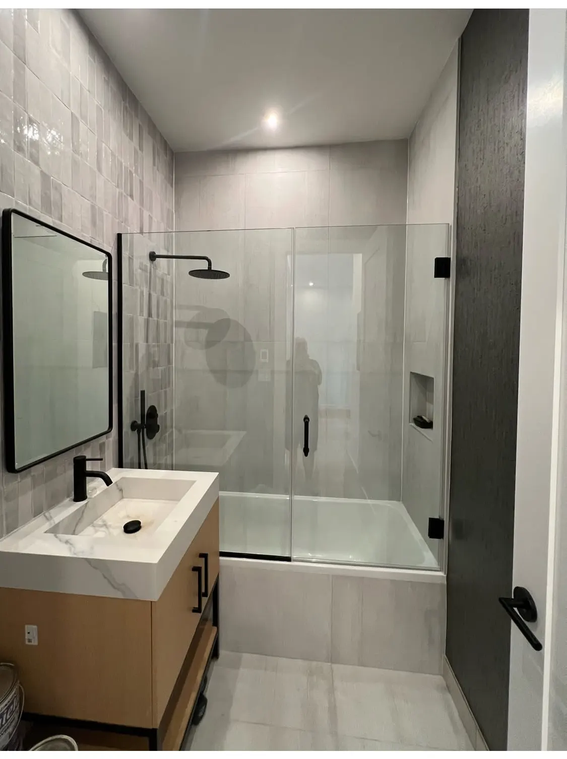 Pivot-style frameless shower door